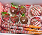 Valentine's Day themed chocolate covered strawberries and pretzels 