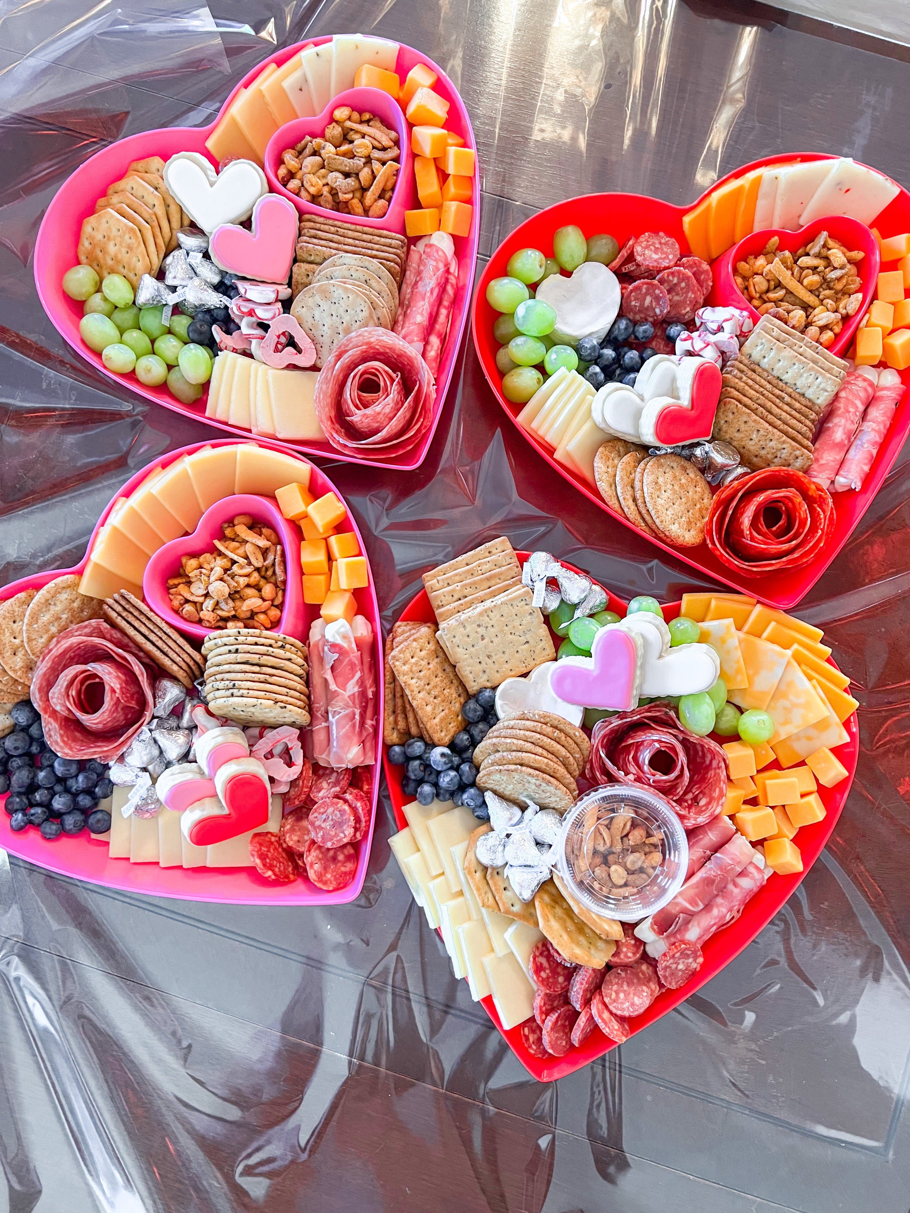 heart shaped charcuterie boards for Valentine's Day delivery to Alabama students.